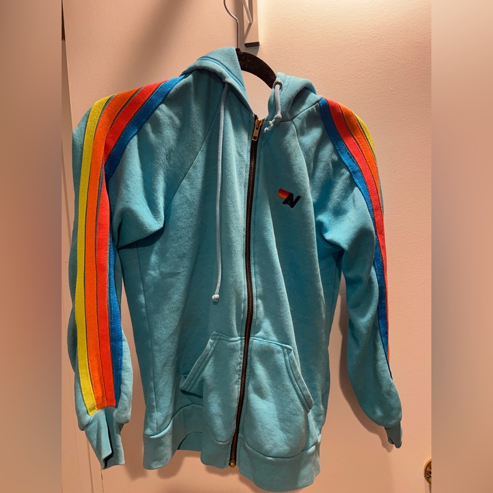 Neon blue aviator nation zip up with neon stripe on the sleeves